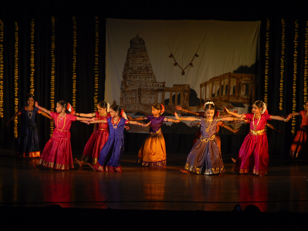 Students performing Bharatanatyam on stage